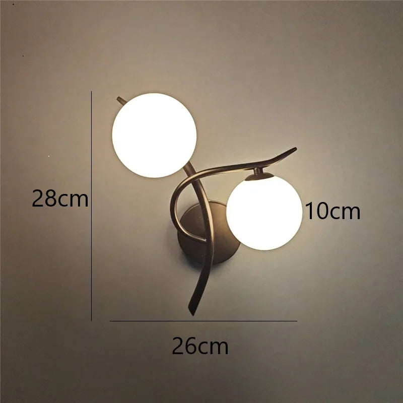 Nordic iron wall lamp with two glass globe LEDs for modern bedroom decor