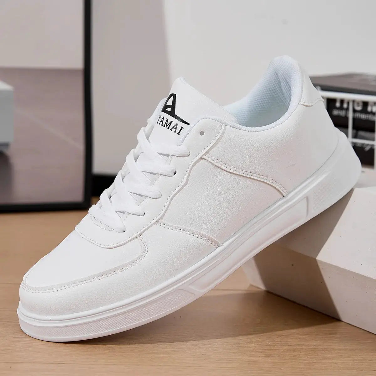 Leather white sneakers for men; breathable casual skate-style shoes with Tamai logo