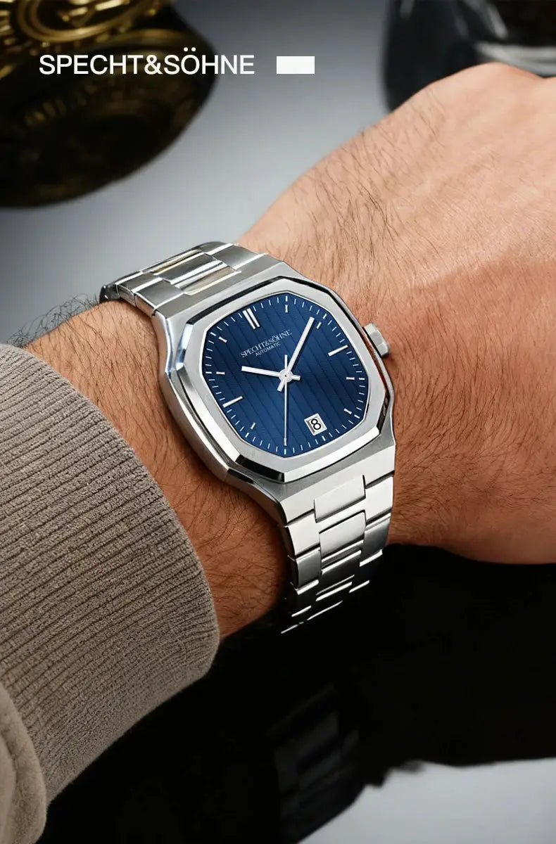 Specht&Söhne stainless steel automatic watch with blue dial and date window on the wrist