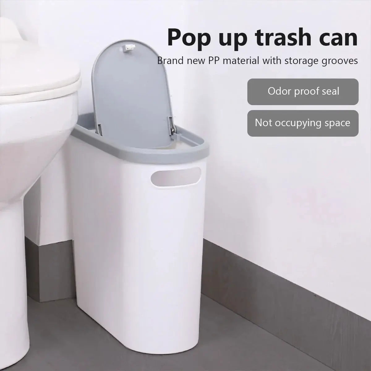 Bathroom trash can with lid, white plastic tall bin with gray lid and side opening beside a toilet.