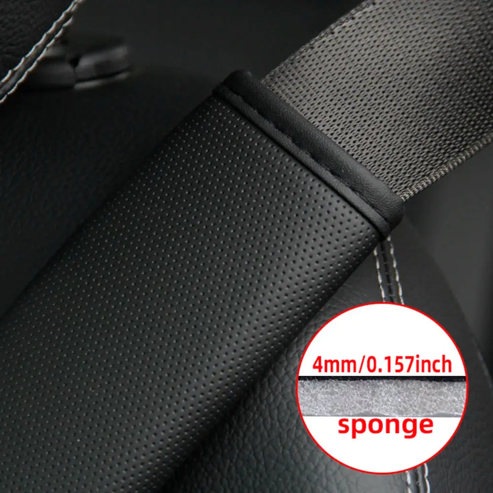 1-piece PU leather embossed car seat belt shoulder cover, black with perforated texture and 4mm sponge padding