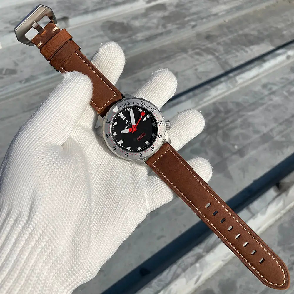 STEELFLIER SF752 wristwatch with brown leather strap, black dial, and luminous hands