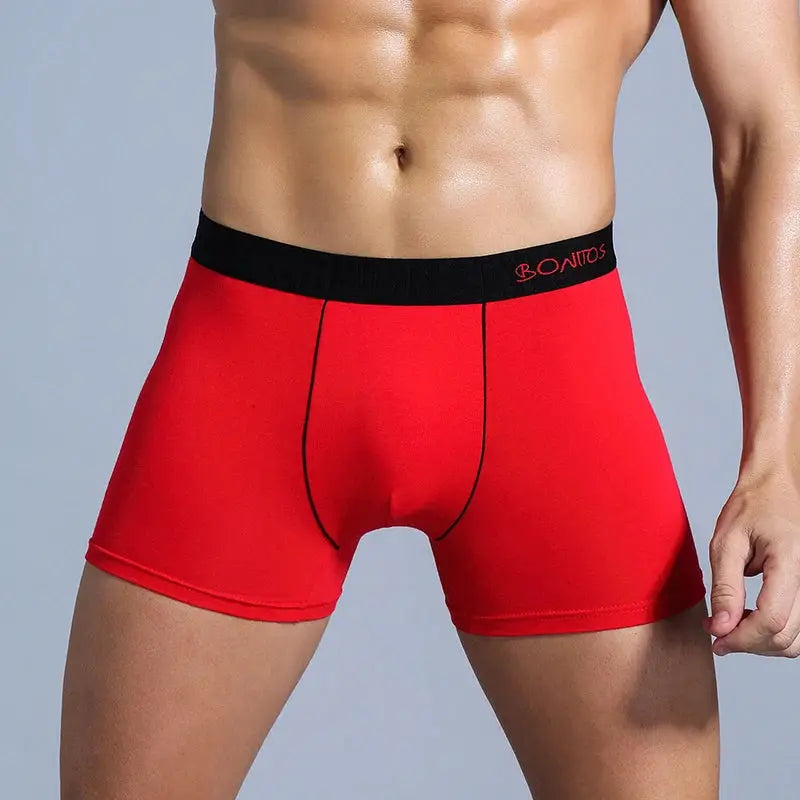Men's red cotton boxer briefs with black waistband from Simples Market featuring BONITOS logo