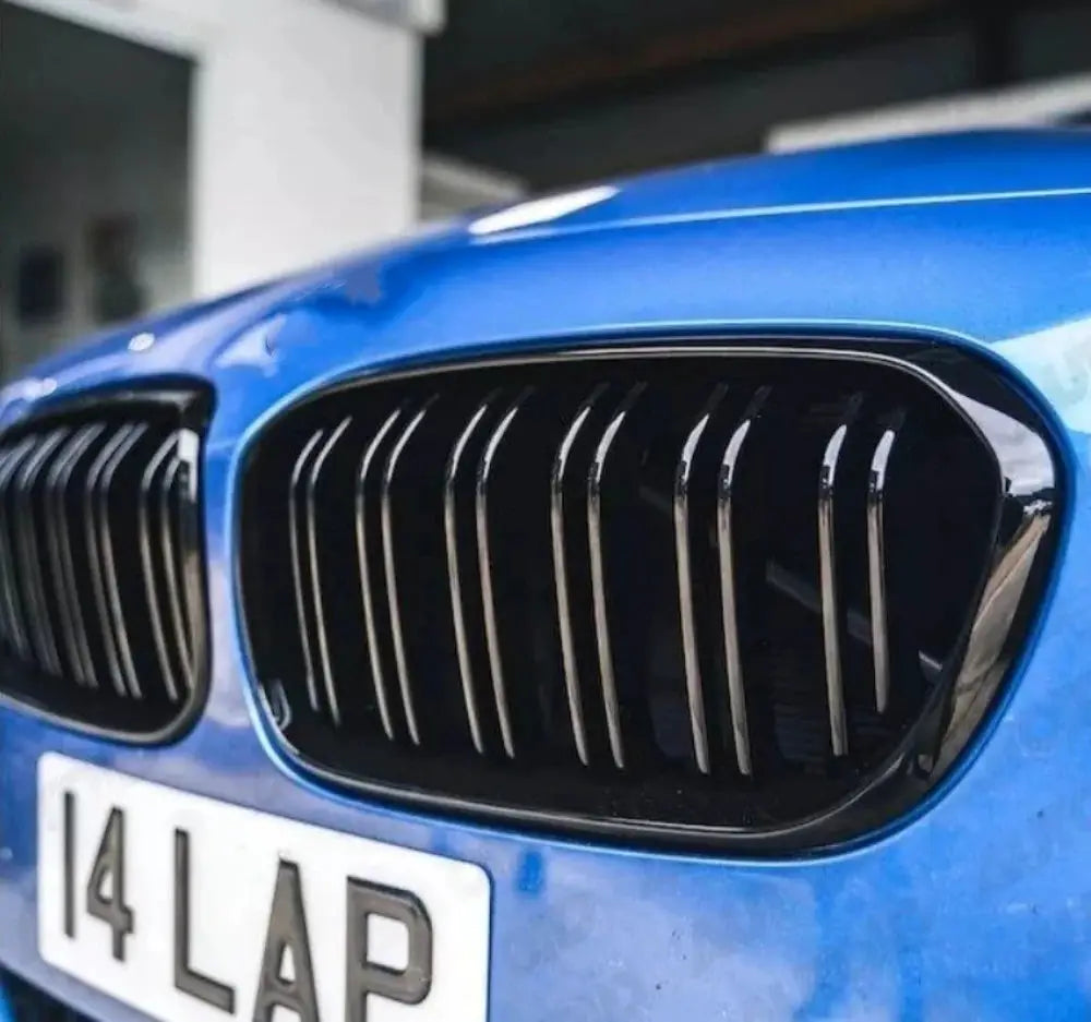 Pair of front kidney grilles for BMW 1 Series F20/F21 (2011–2014), gloss black, double-slatted racing replacement