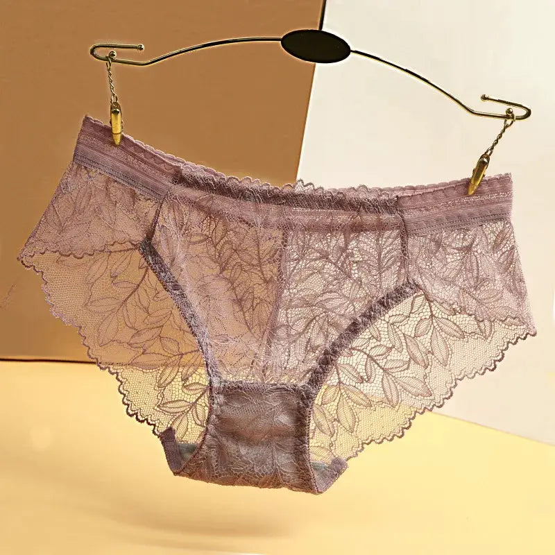Women's lace panties by Simples Market, lavender floral lace low-rise briefs on a hanger