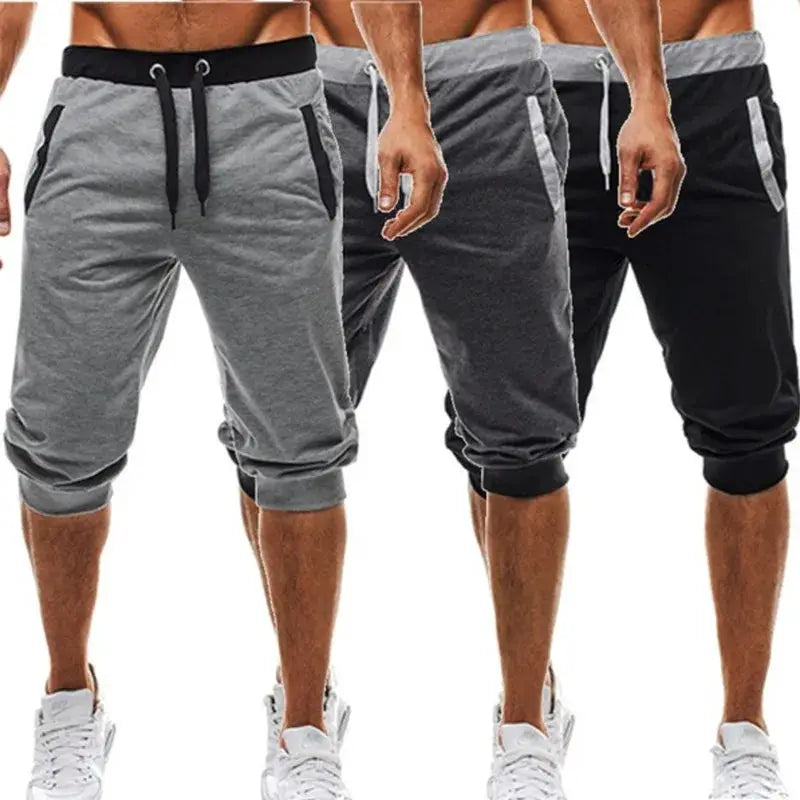 Simples Market men's seven-quarter jogger pants in grey, charcoal, black; three pairs with drawstring waist.