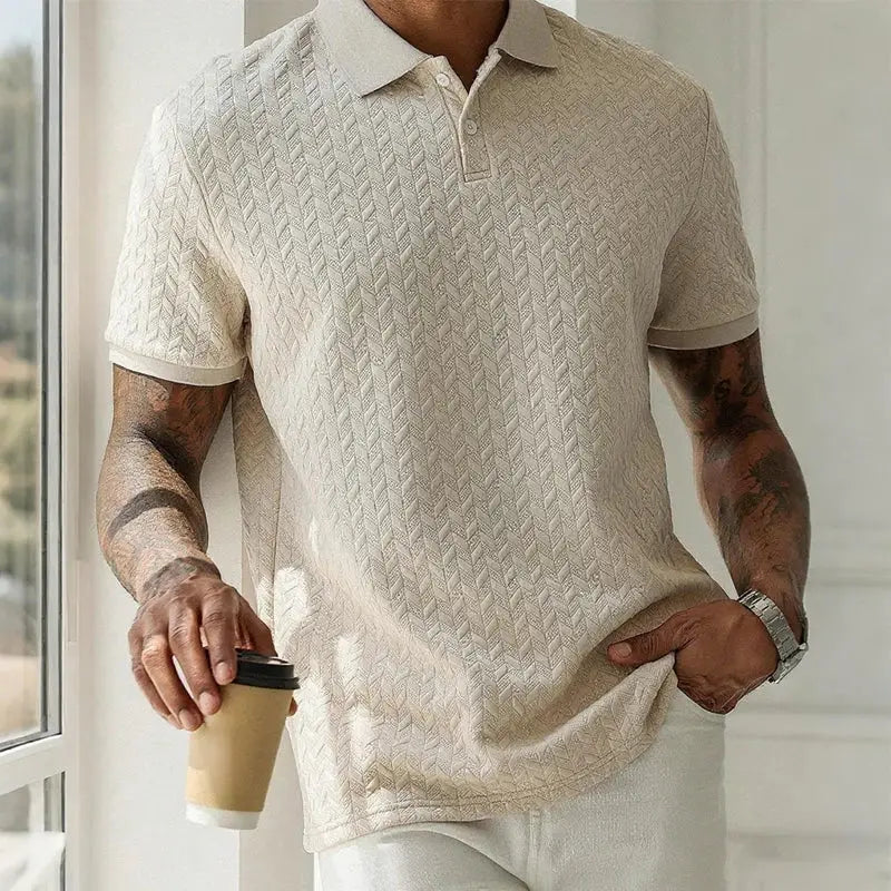 Men's beige textured knit polo shirt with short sleeves and polo collar.