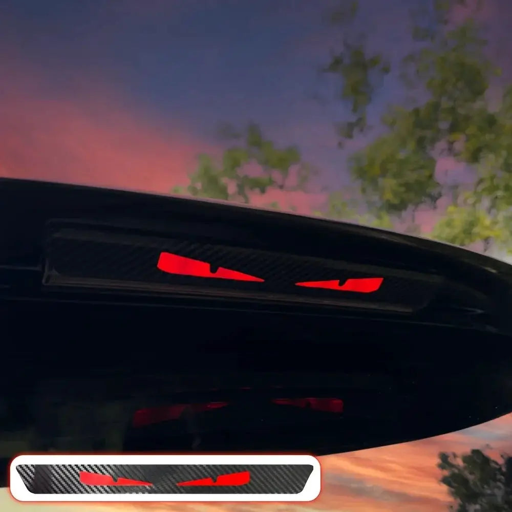 Monster Eyes Car Rear Light Sticker by Simples Market, carbon fiber pattern, red devil-eye tail light decal.