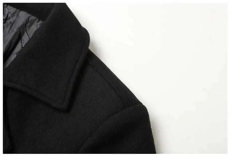 Men's black double-breasted wool coat with wide lapels.