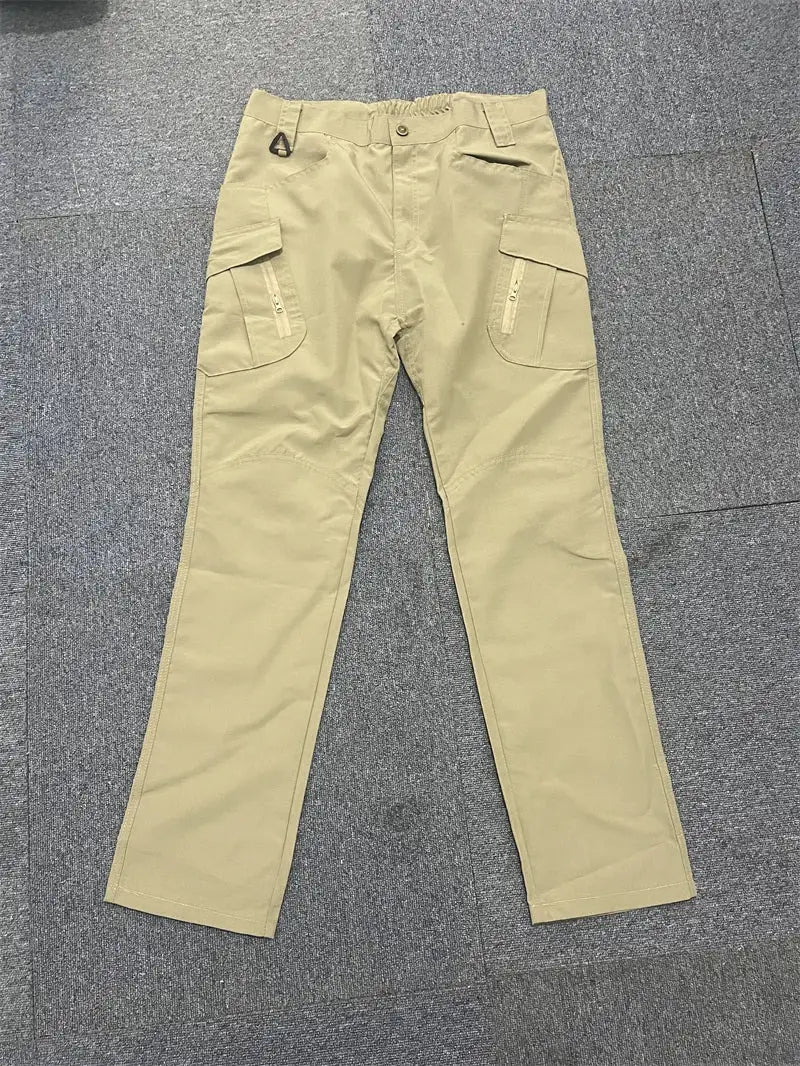 Men's khaki cargo pants with multiple pockets and belt loops