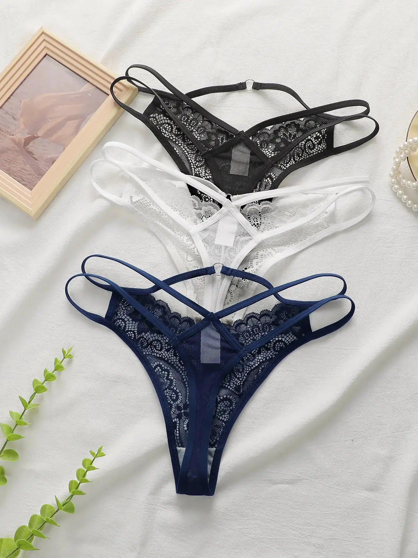 3-pack floral lace thong underwear by Simples Market in black, white, and navy