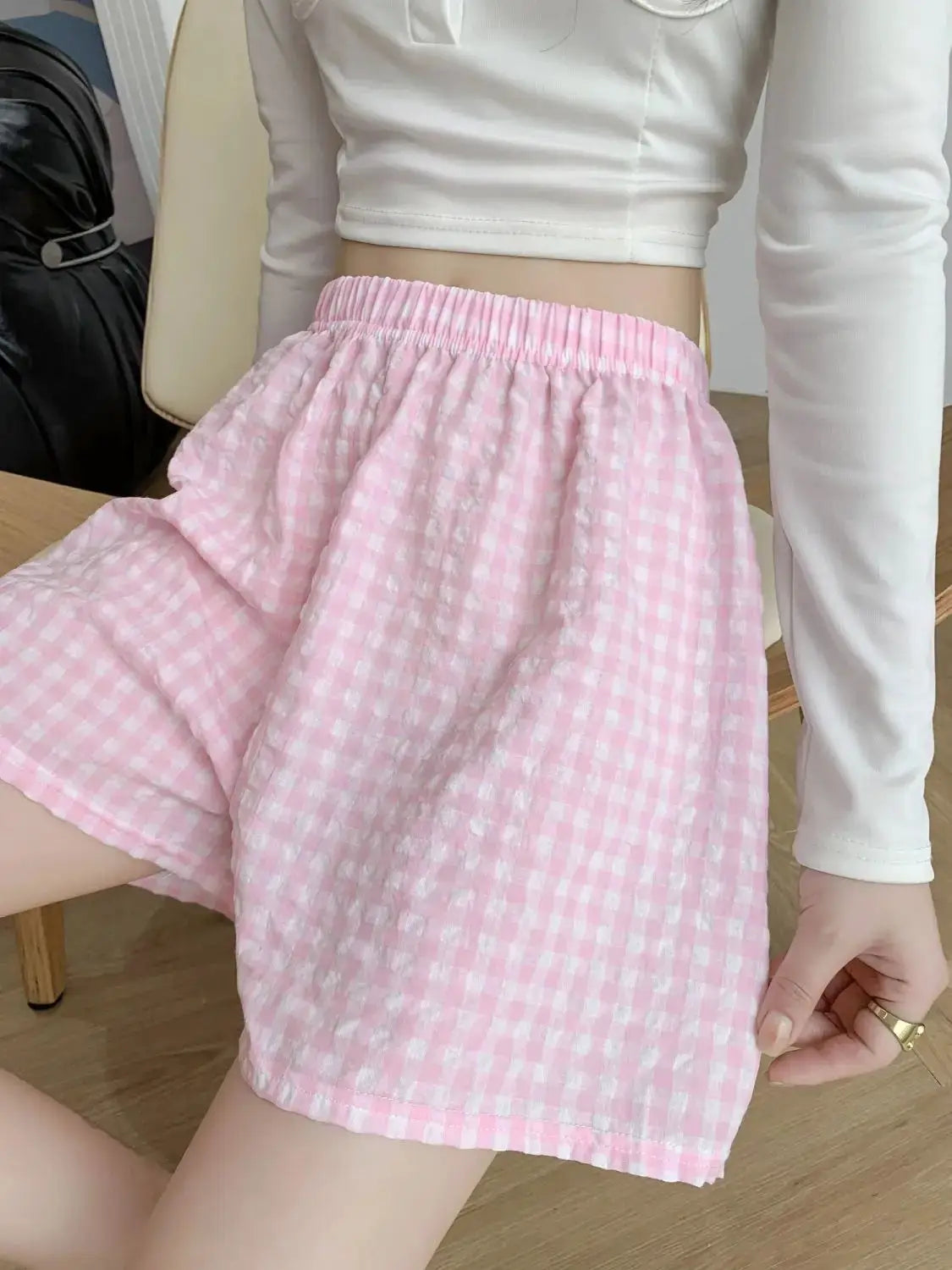 Summer Home Shorts pink and white gingham pajama shorts with elastic waistband.