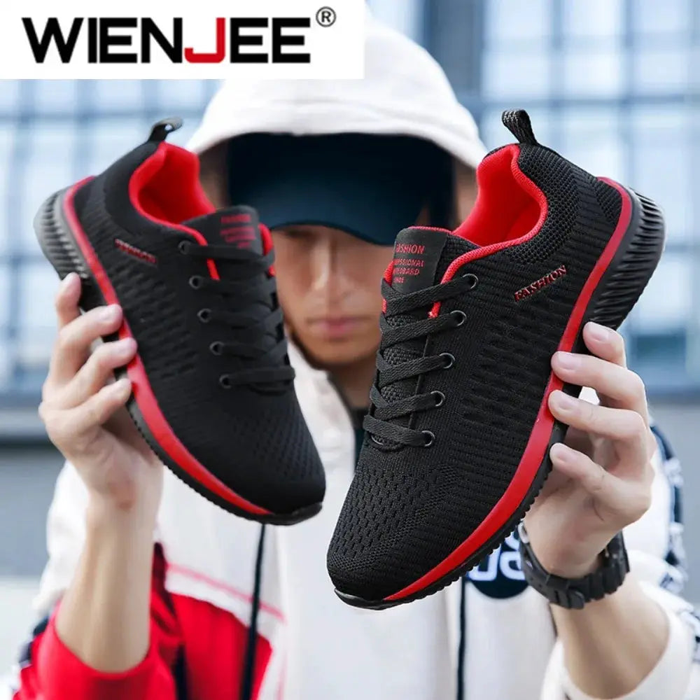 Pair of Wienjee black knit running shoes with red trim and sole accents, breathable casual sneakers