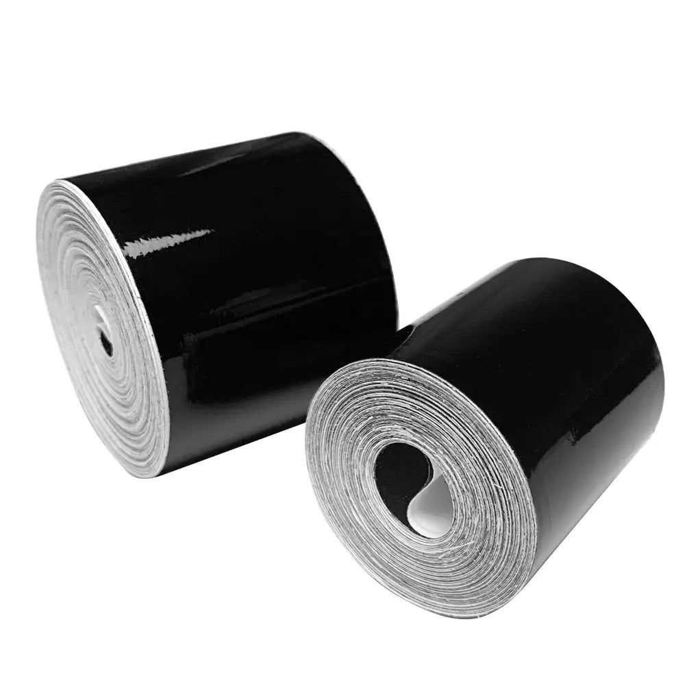 Two rolls of glossy black car wrap vinyl for protection and styling
