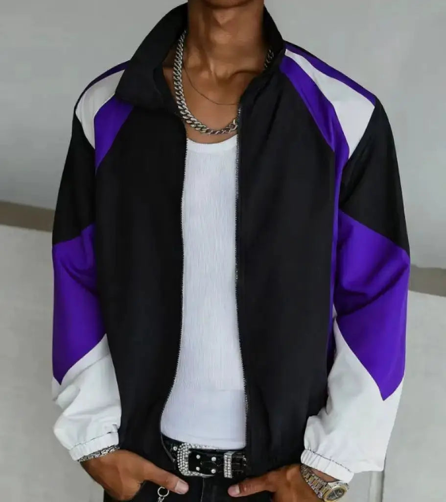 Men's color-blocked lightweight jacket with black body and purple/white sleeves, front zip.