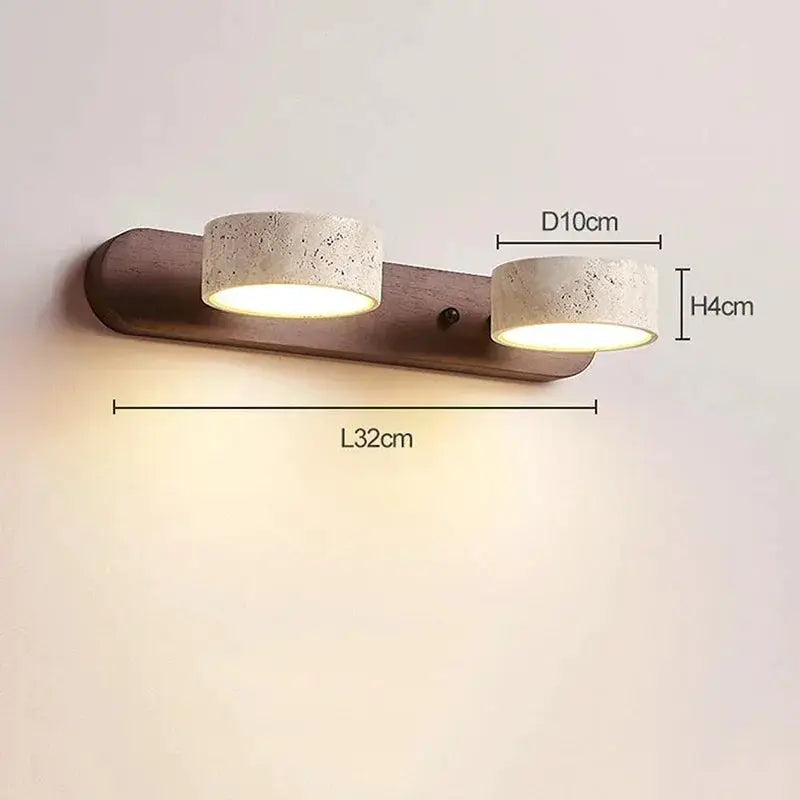 Two-light round LED wall lamp by Simples Market on wood base with beige stone-textured shades, 32cm long