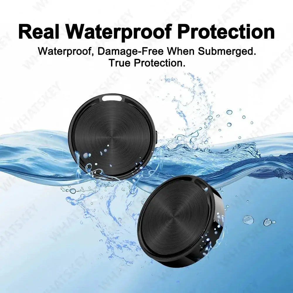 Tag waterproof Bluetooth GPS trackers, two black circular keychain devices