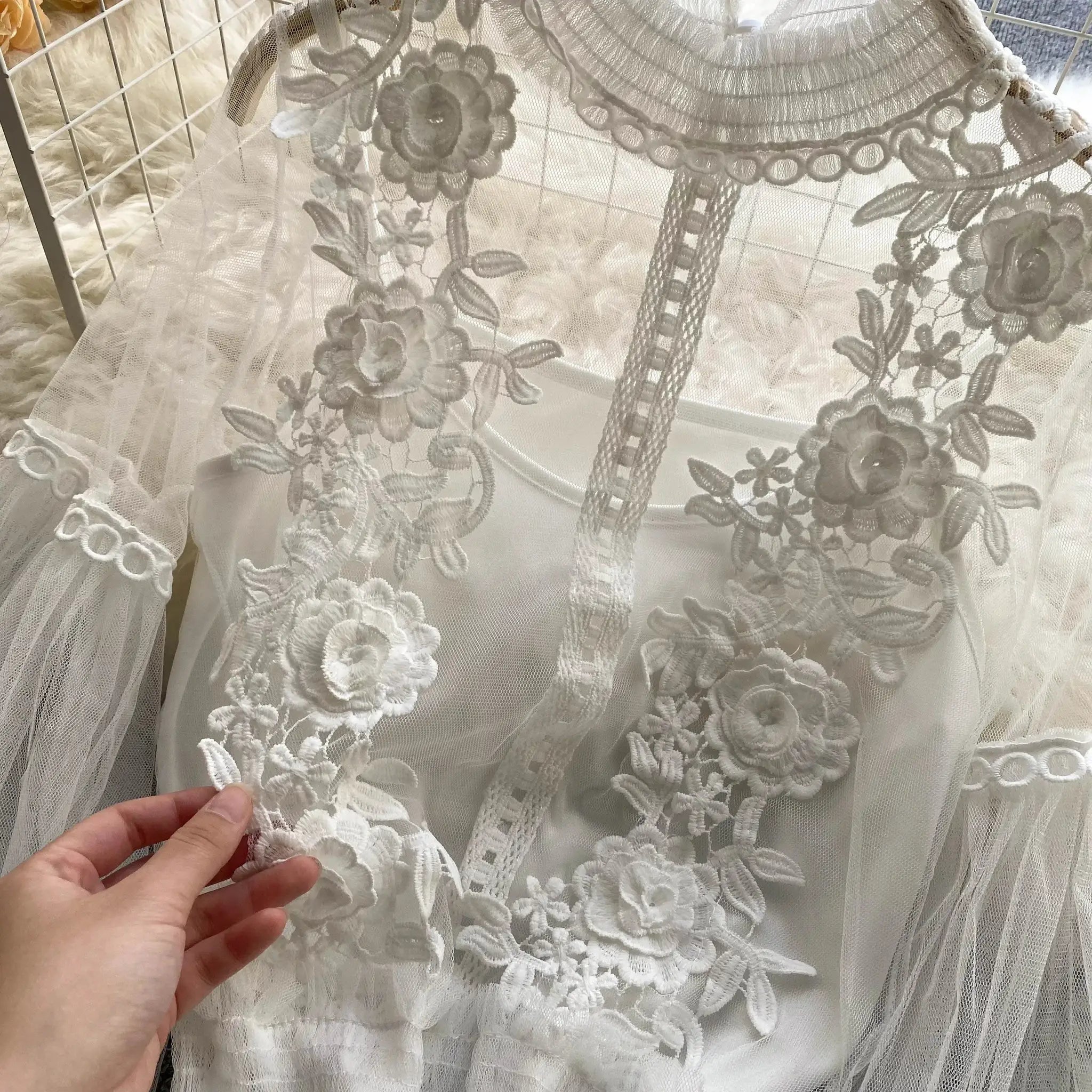Lace puff long-sleeve blouse in white with floral embroidery and scalloped edges