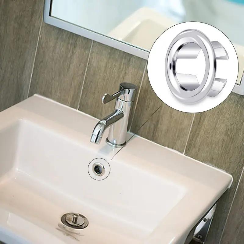 4-pack plastic sink hole overflow covers by Simples Market, round white plugs.