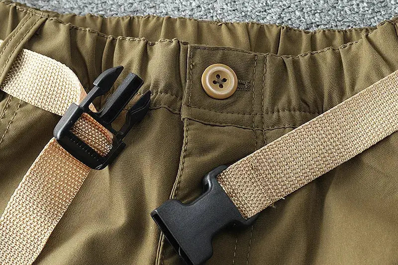 Simples Market waterproof fleece-lined outdoor pants, olive green with beige belt and buckle.