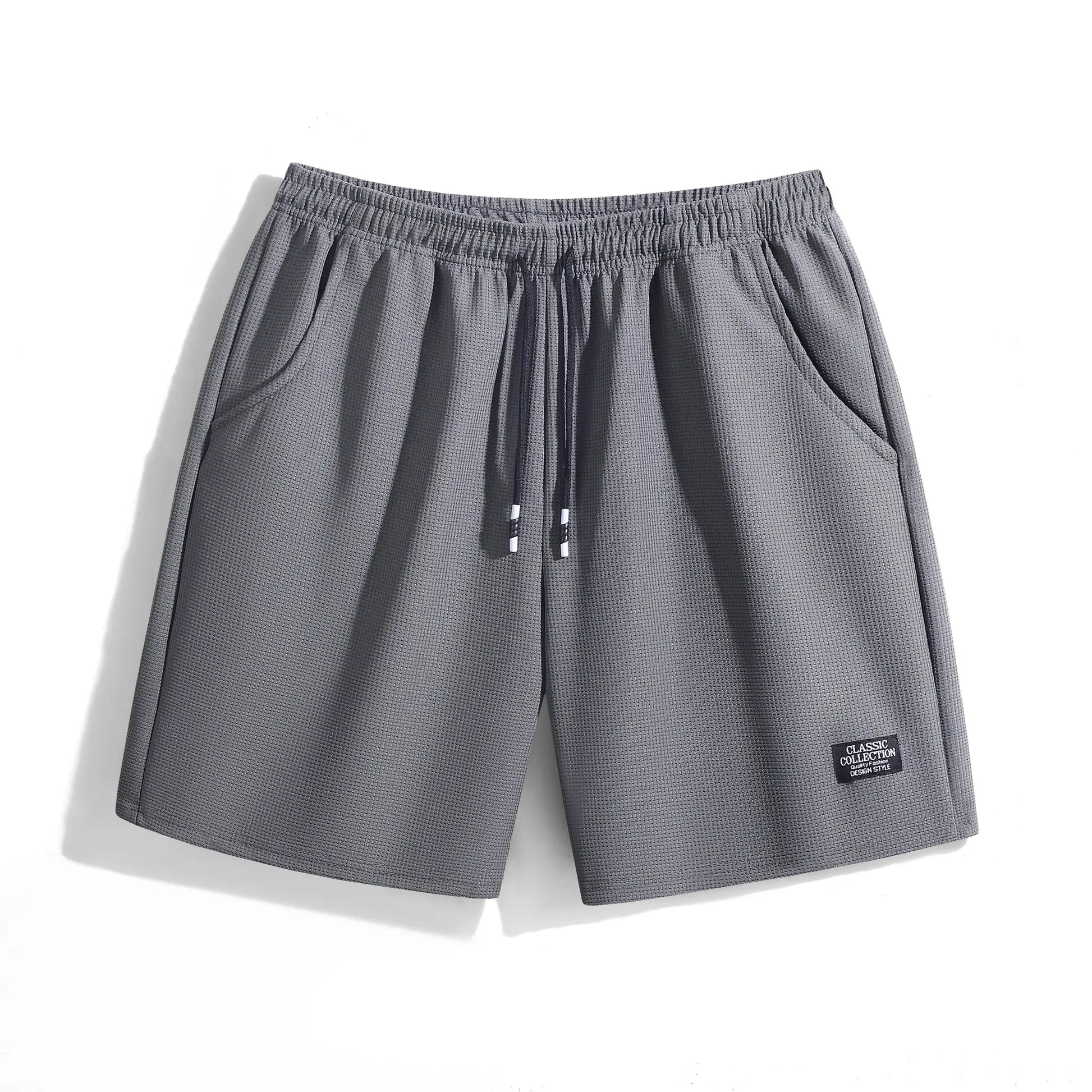 Men's textured gray shorts with elastic waistband, side pockets and drawstring.