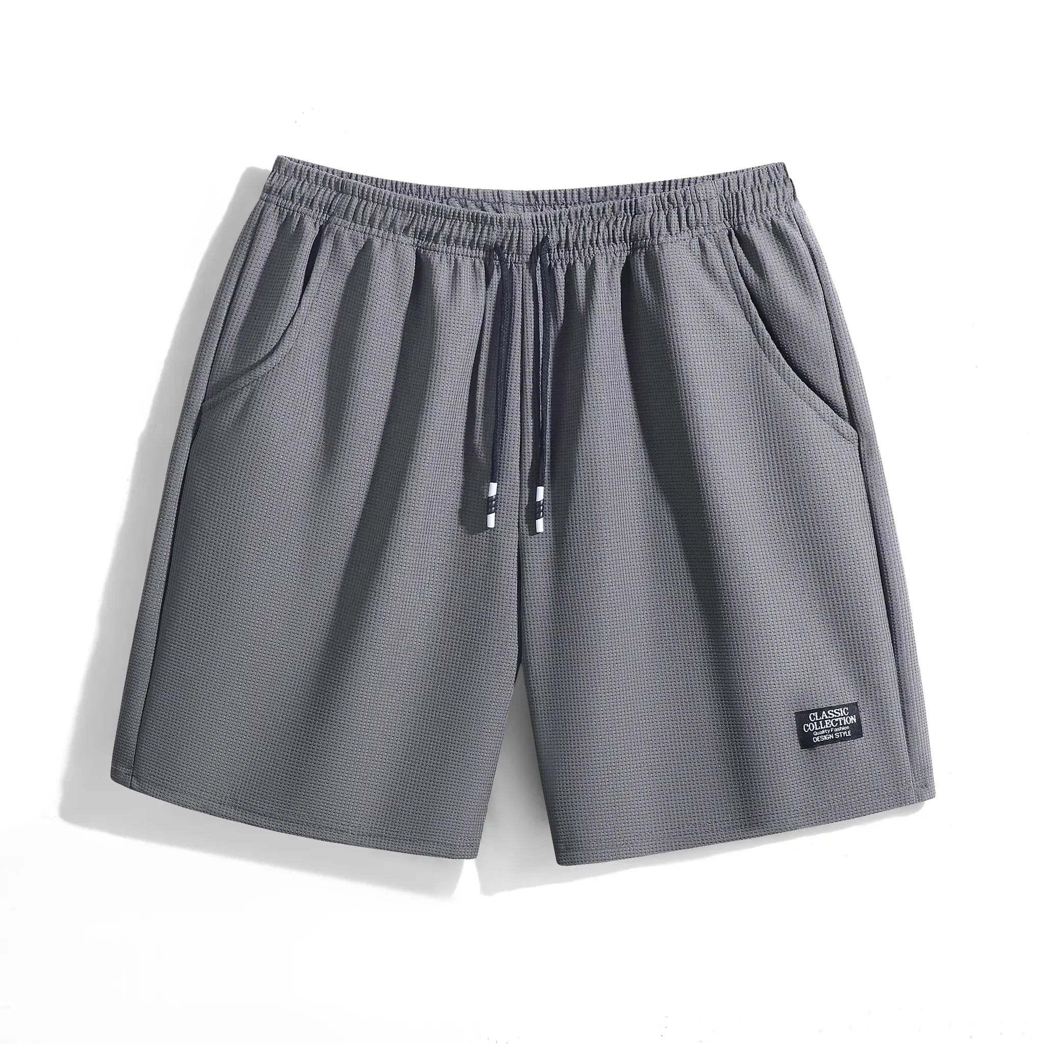 Men's textured gray shorts with elastic waistband, side pockets and drawstring.