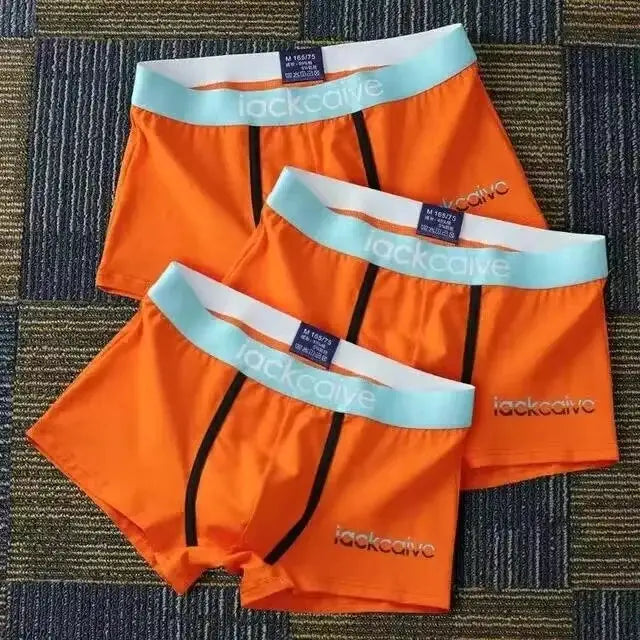 3-pack orange cotton men’s boxer briefs with light blue waistbands and black seams, jackcave
