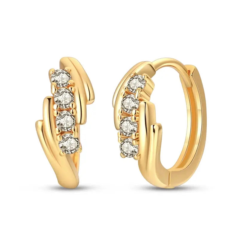 Pair of gold-tone hoop earrings with a row of clear crystals on the front.