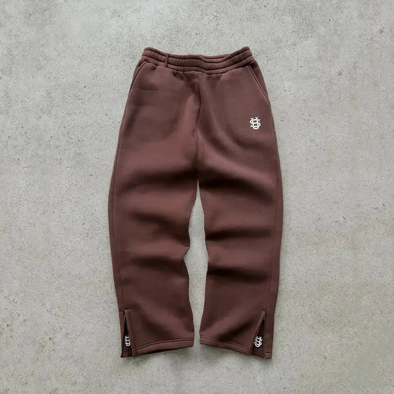 Autumn drawstring zipper sweatpants in brown by Simples Market with zippered hems.