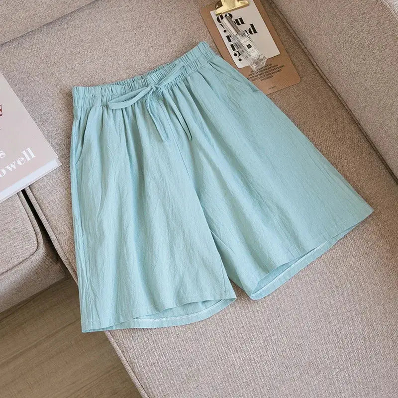 Women's cotton shorts, light blue, high-waisted loose-fit with two pockets; Simples Market