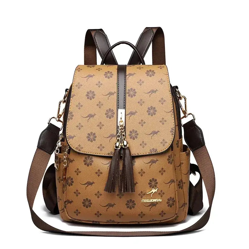 Ladies backpack by Simples Market, tan leather-look bag with floral print, tassel accents and brown straps