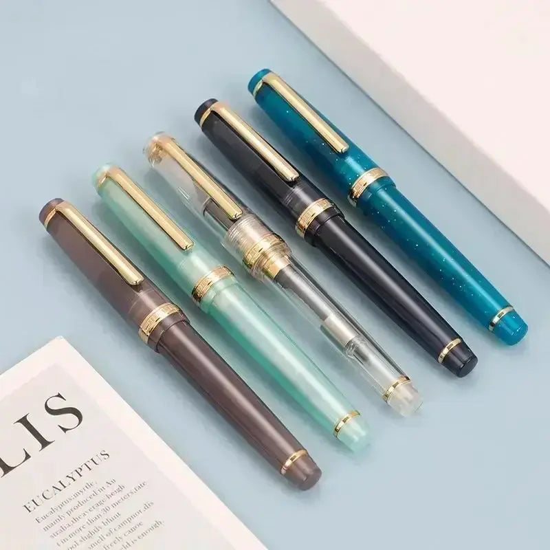 Jinhao 82 fountain pen set, six gold-trim pens in brown, mint, clear, black, teal and turquoise.