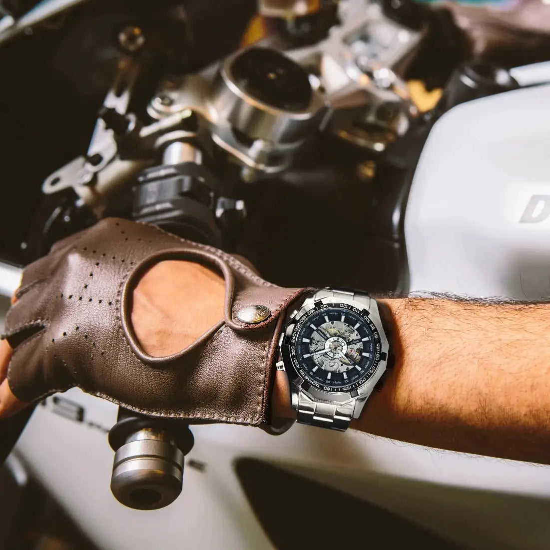 Winner Classic Skeleton Watch for men with stainless steel strap and luminous hands on wrist