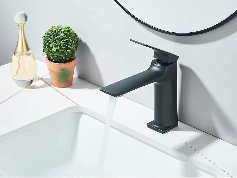 Black matte deck-mounted bathroom sink mixer tap with single lever