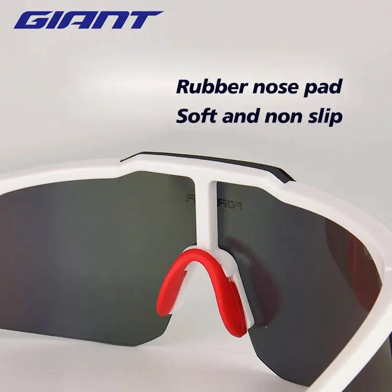 Giant cycling sunglasses with TR90 frame, UV400 protection, white frame, dark lenses, red rubber nose pad.