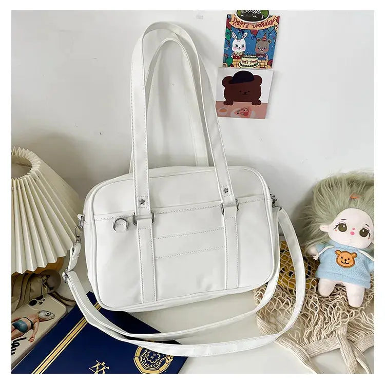 Japanese style JK bag PU leather white shoulder bag with dual handles and detachable crossbody strap by Simples Market
