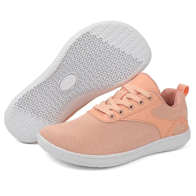 Wide-toed peach knit mesh sneakers with lace-up closure and heel pull tab for walking and casual wear, white sole