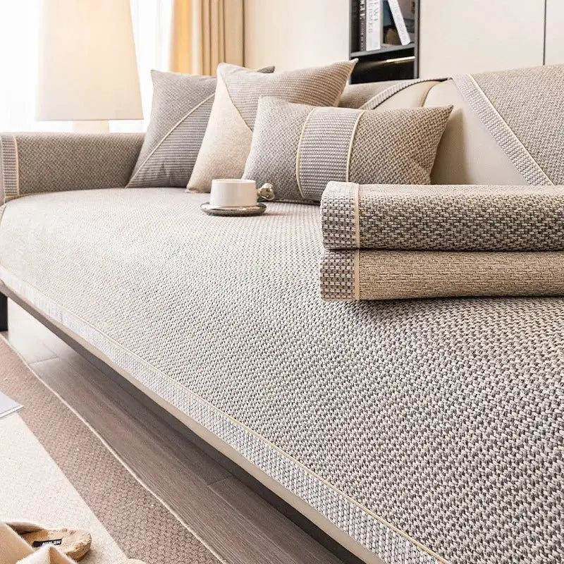 Linen sofa cushion cover set on a woven gray-beige sofa with matching cushions by Simples Market