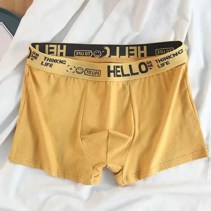 Men's yellow boxer shorts with a black elastic waistband and Hello Life print, breathable high-stretch fabric