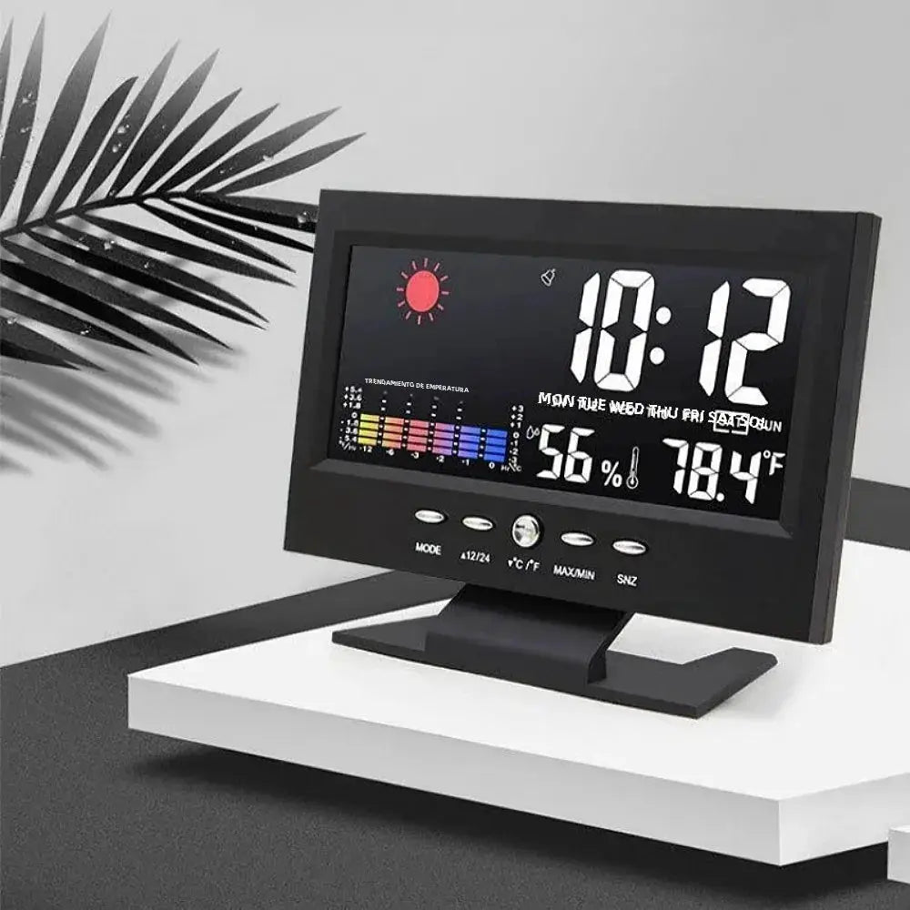 Simples Market digital LCD weather station clock with black frame showing time 10:12, weekday labels, humidity 56% and 78.4°F