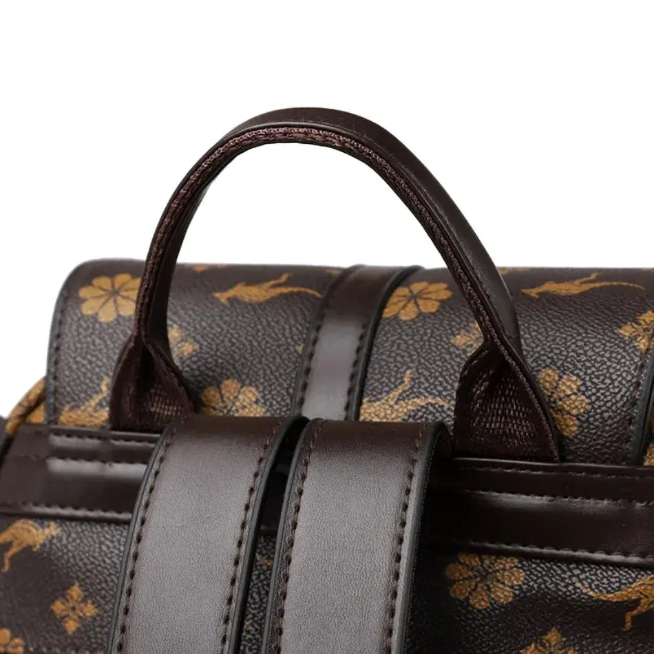 Leather ladies backpack with brown floral print, premium leather, top handle and wide straps, large-capacity design