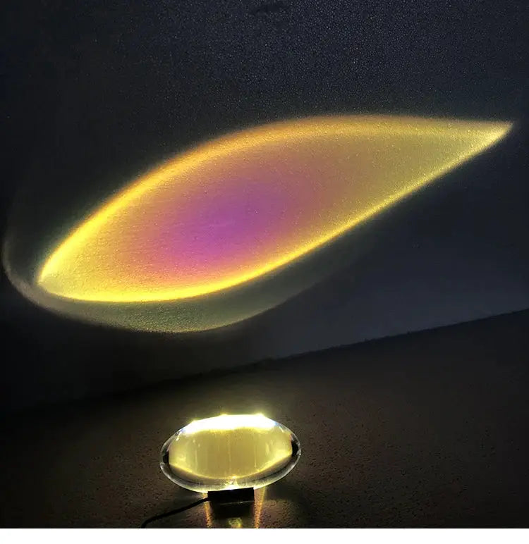 Italian designer table lamp, LED crystal egg with warm yellow glow projecting onto the ceiling by Simples Market