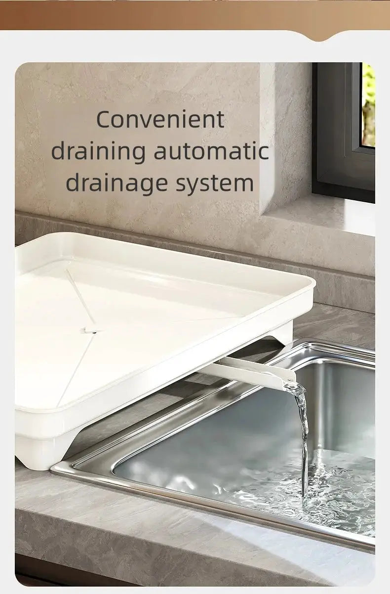 Stainless steel kitchen draining rack with detachable white tray for bowls and plates, drains into sink