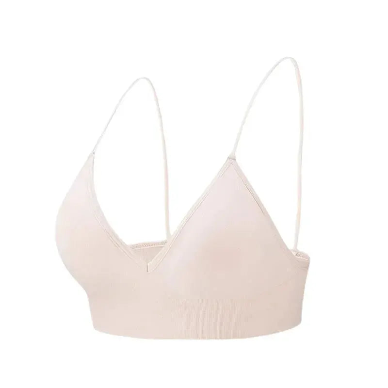 V-neck seamless triangle-cup bra camisole in nude beige with thin adjustable straps.