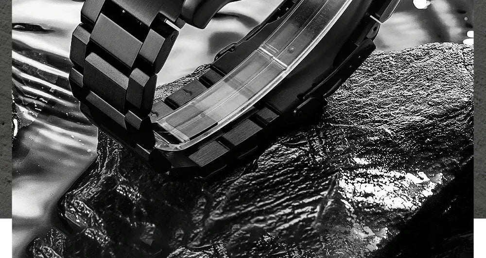 ADDIESDIVE luxury men's quartz watch with black stainless steel strap on a wet rock