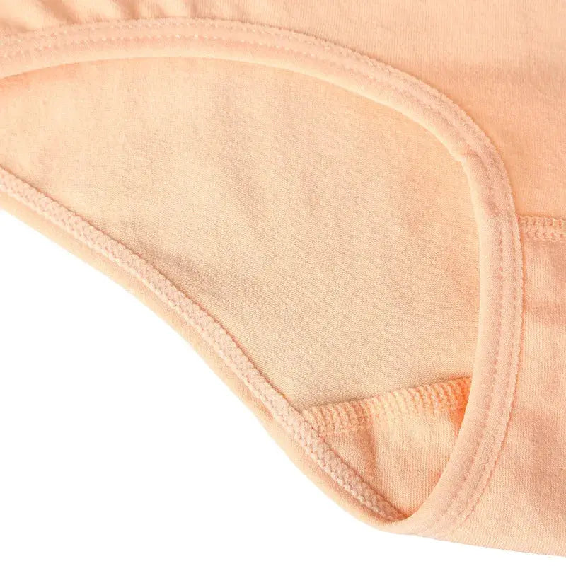 Plus-size peach cotton high-waist women's panties with soft knit fabric and reinforced stitching