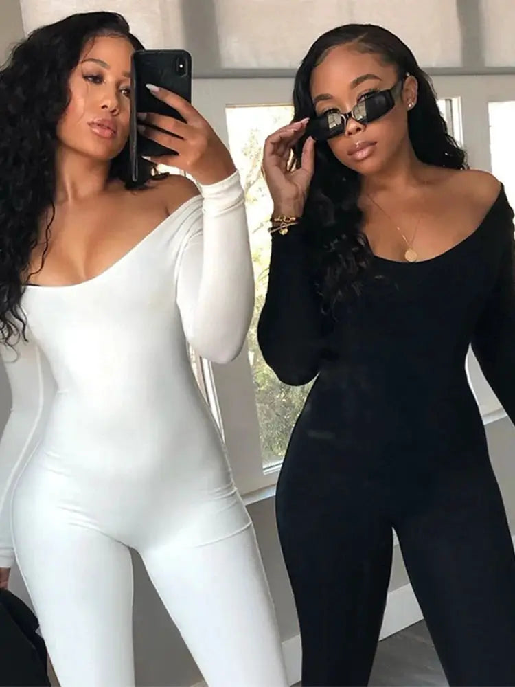 Two women's long-sleeve solid-color jumpsuits, white and black, slim-fit pullover style
