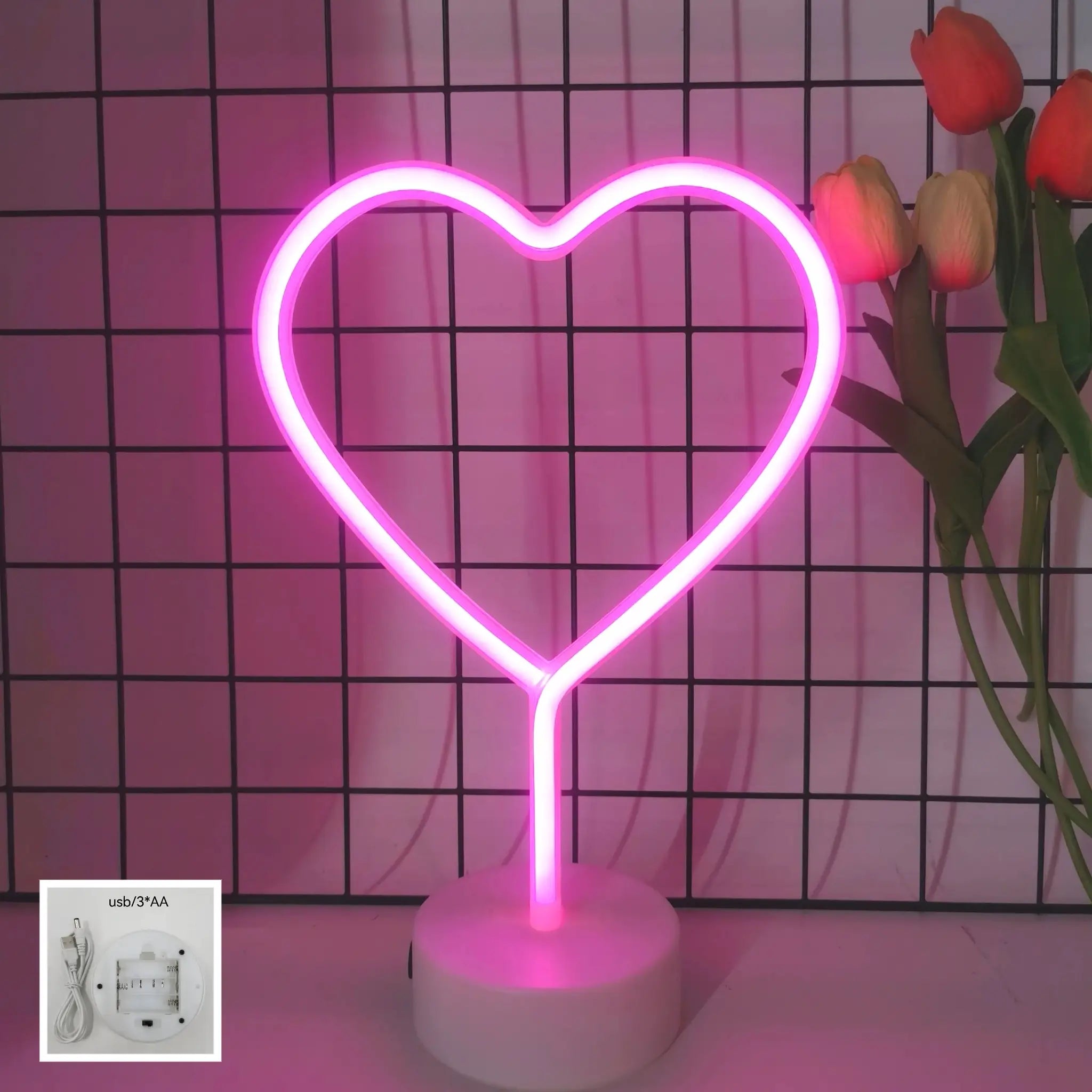 Pink heart-shaped neon light on a white base, USB or battery powered, ideal gift decor.