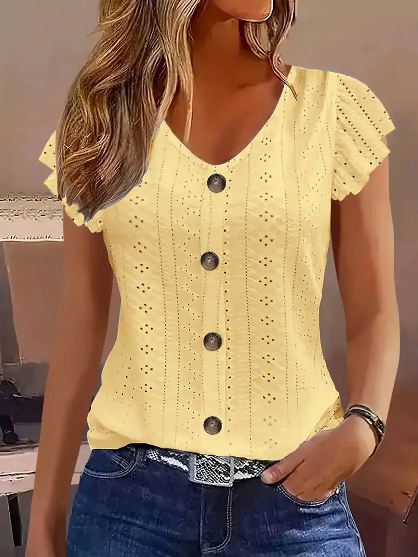 Yellow women's eyelet button-front blouse with V-neck and flutter sleeves