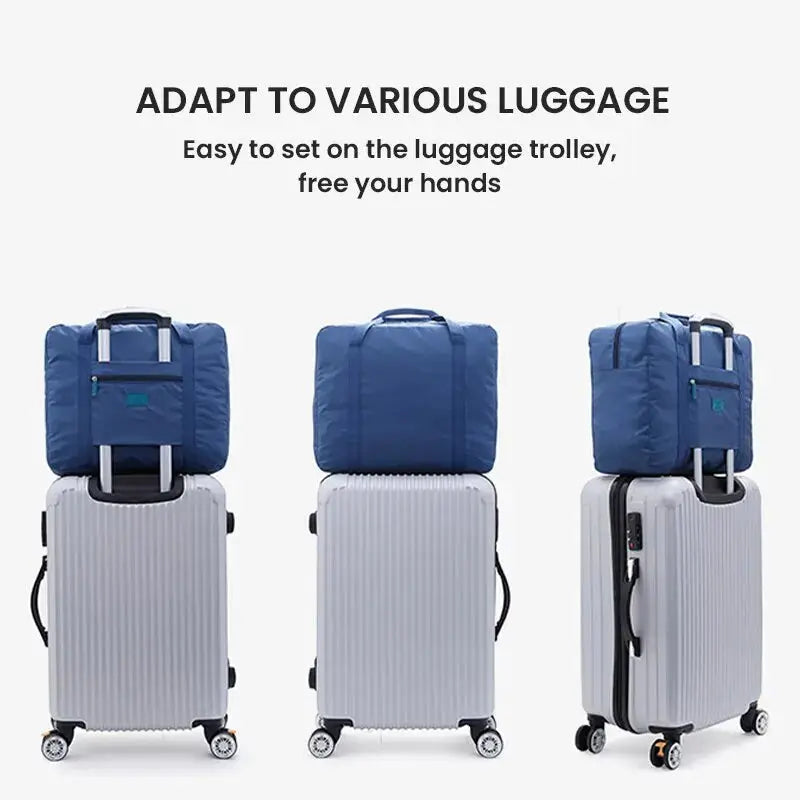 Foldable blue travel duffel bag atop a silver carry-on suitcase.
